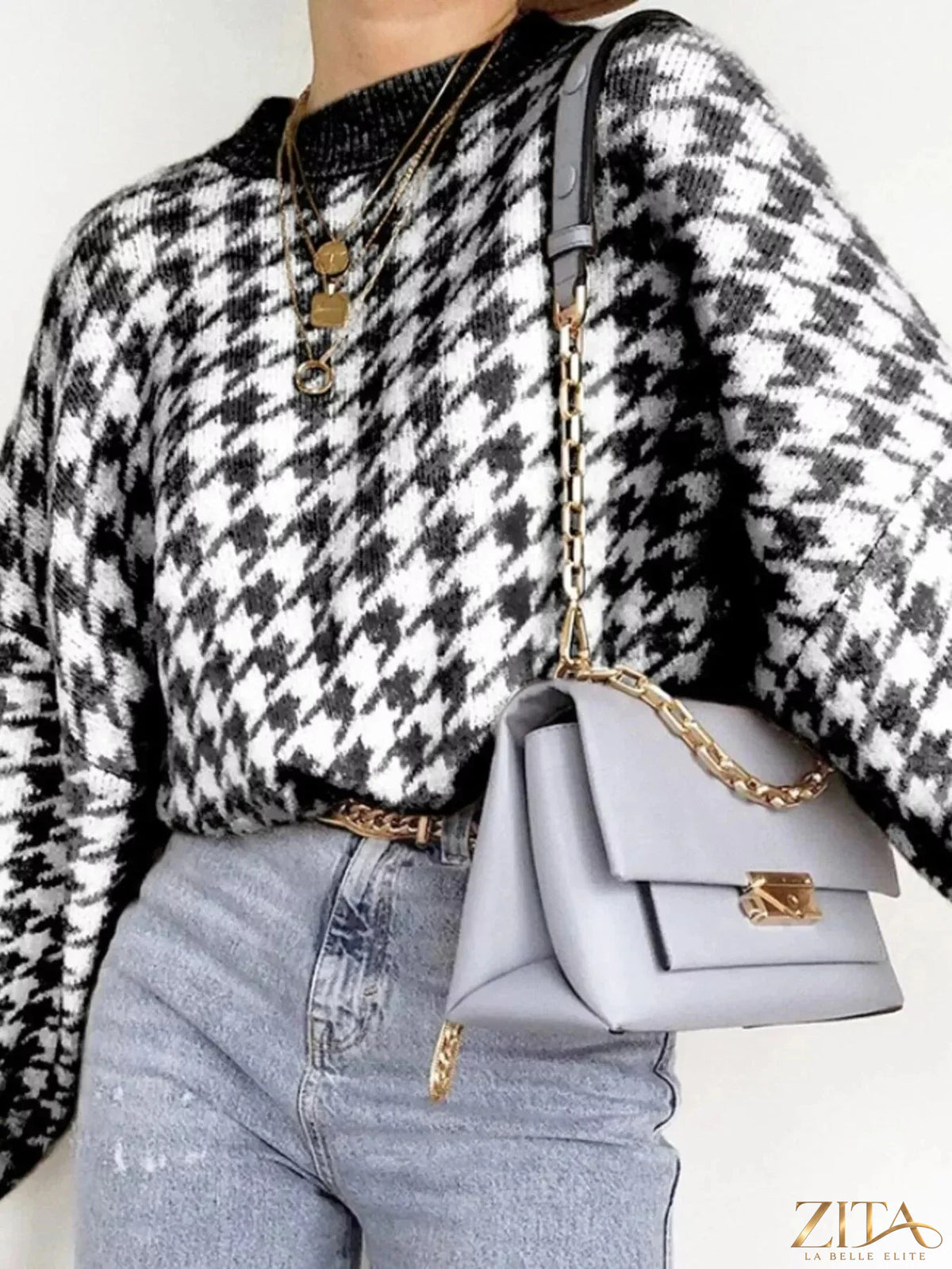 Zita La Belle Elite oversized sweater with classic houndstooth pattern, soft knit fabric, and relaxed fit in neutral tones.