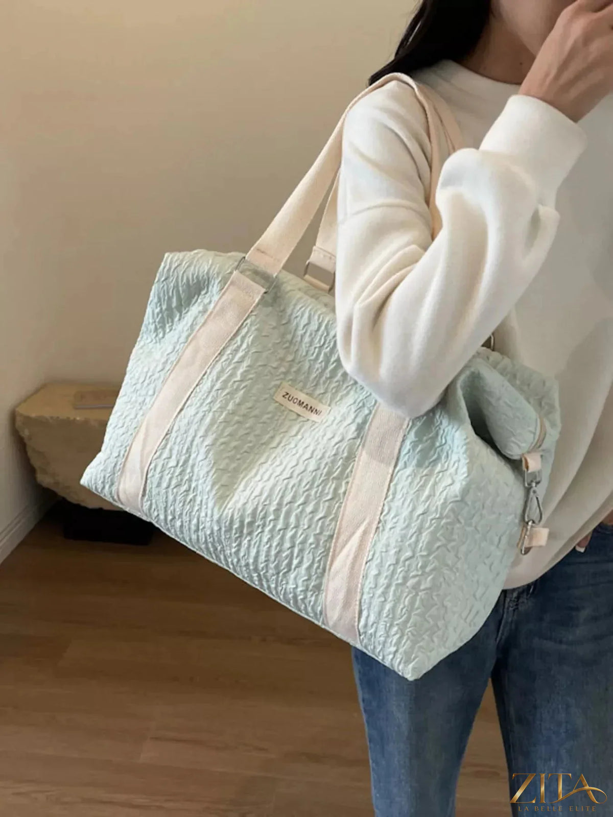 Zita La Belle Elite texture travel bag with adjustable strap, showing its stylish fabric and functional design for travel accessories.