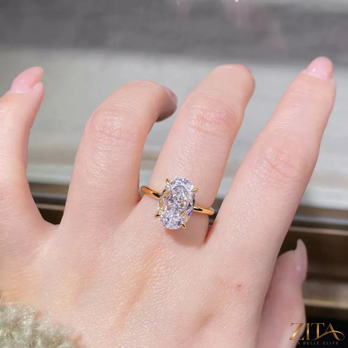 18K gold-plated zircon ring by Zita La Belle Elite featuring a sparkling zircon stone and elegant band design.