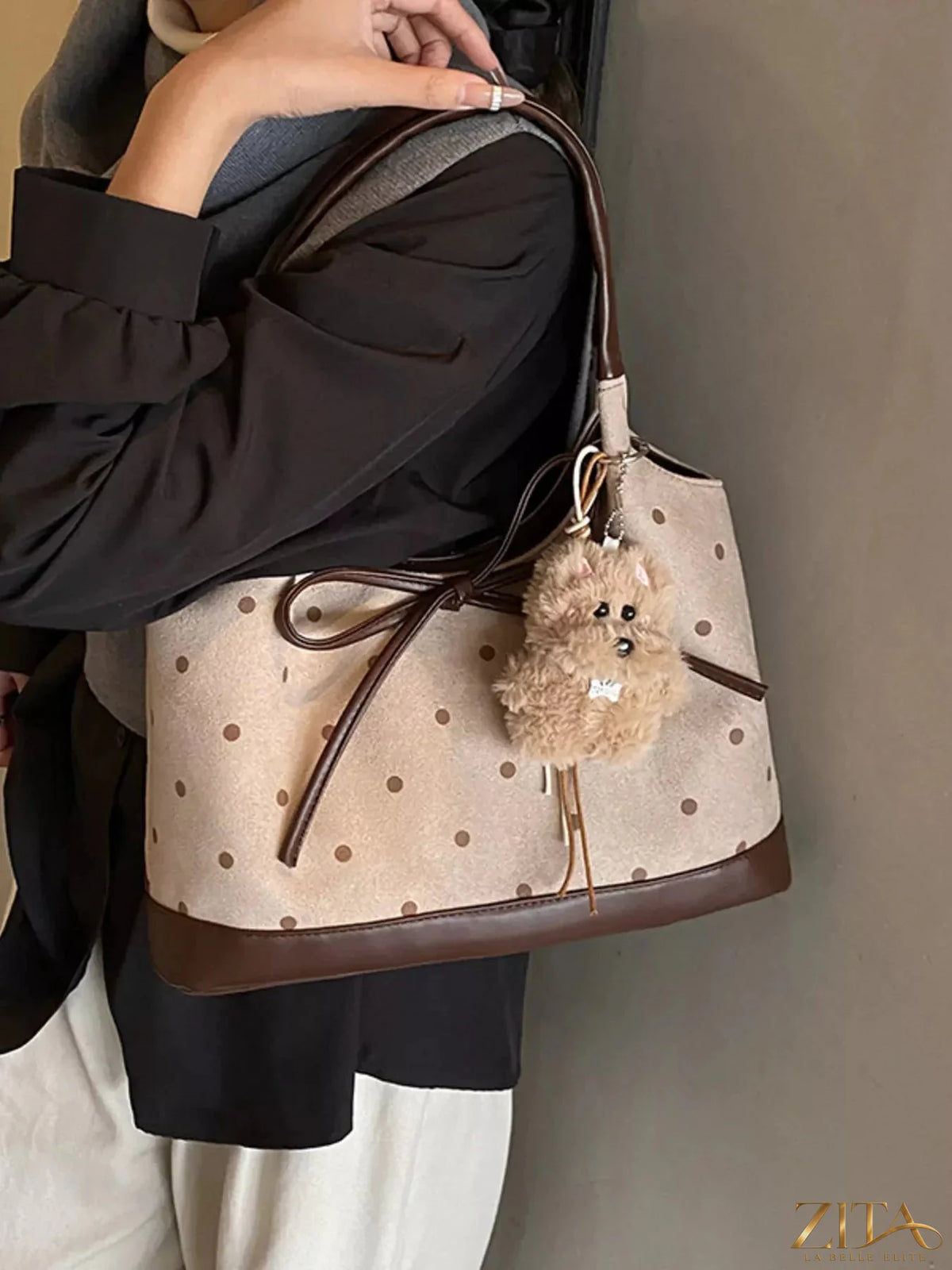 Zita La Belle Elite polka dot bow shoulder bag with adjustable strap and stylish design, perfect for casual or evening wear.