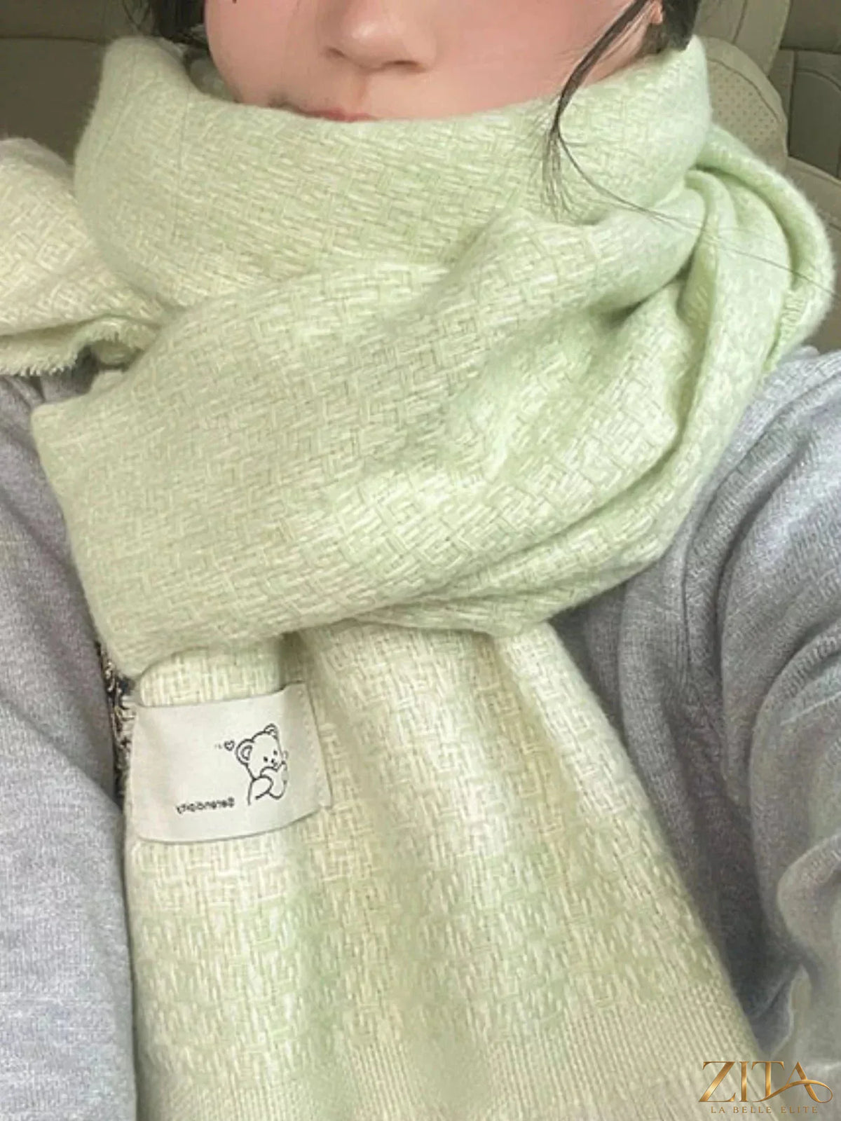 Zita La Belle Elite raw hem scarf with fringed edges in soft, lightweight fabric, displayed in a neutral color.