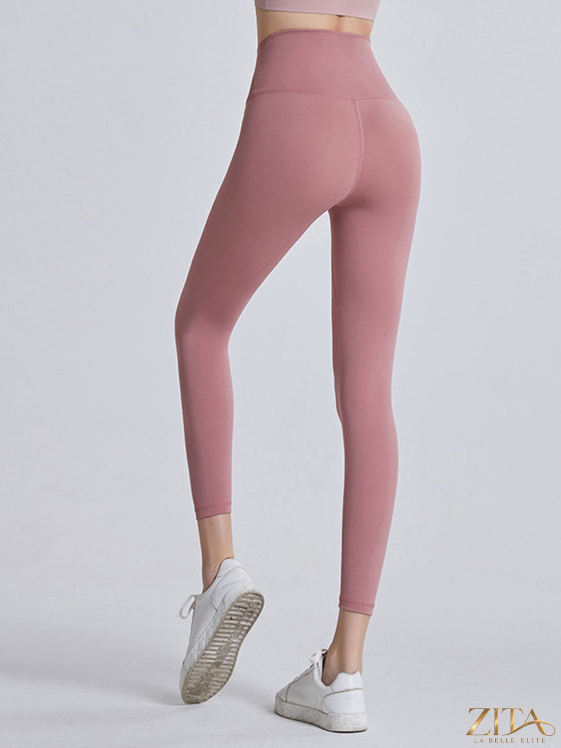 Zita La Belle Elite wide waistband sports leggings in black, shown on a model, featuring a stretchy, comfortable fit for active wear.