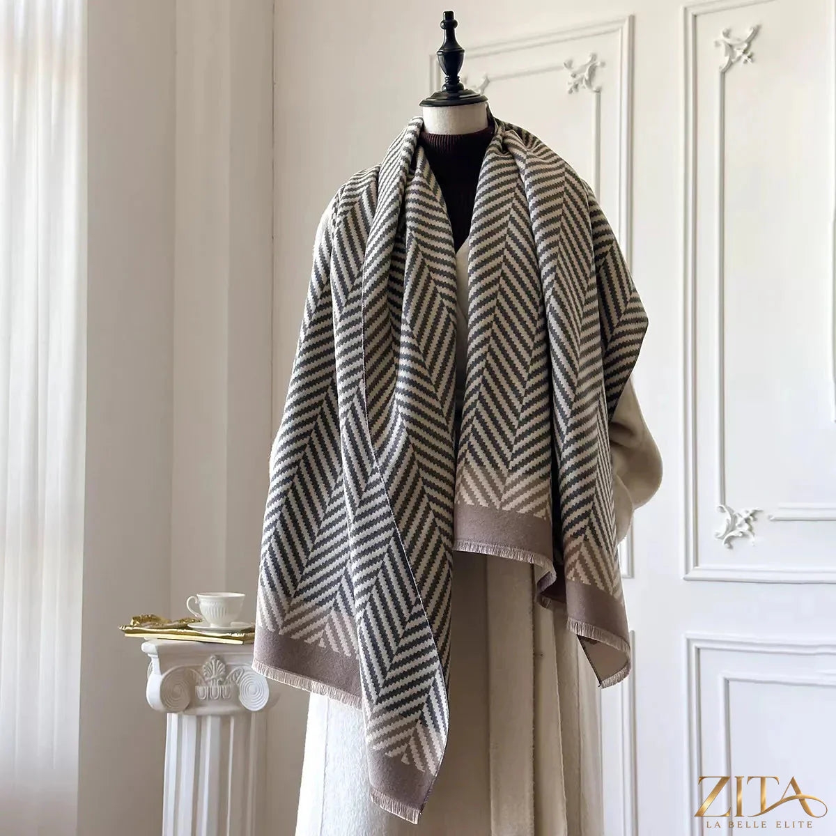 Soft raw hem scarf by Zita La Belle Elite featuring a cozy, lightweight fabric with frayed edges for a stylish, relaxed look.