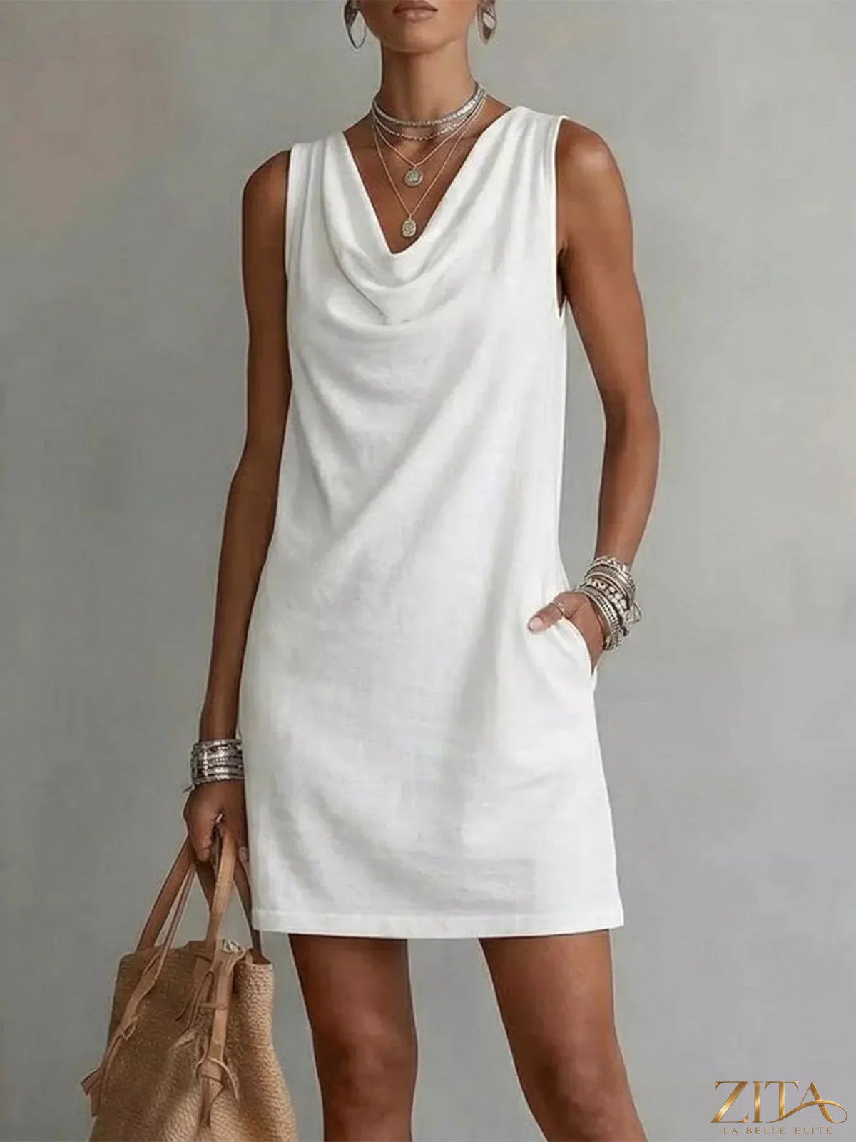 Zita La Belle Elite casual sleeveless cowl neck mini dress in soft fabric, displayed on a hanger against a neutral background.