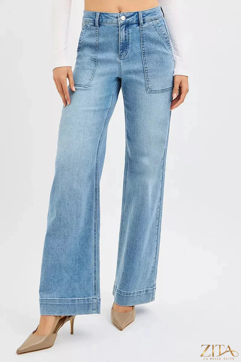 Plus size RISEN high rise straight leg jeans by Zita La Belle Elite, shown on a model with a dark wash and classic fit.
