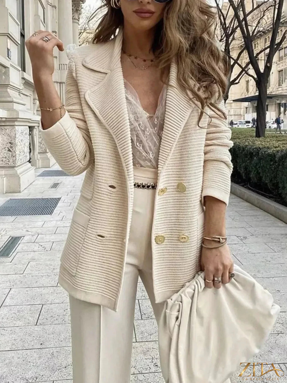 Zita La Belle Elite texture knit double-breasted blazer with lapels and button details, displayed on a white background.