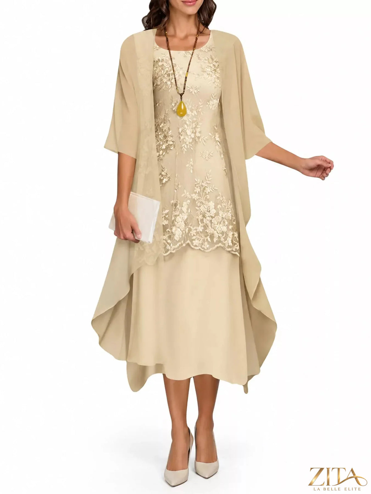 Plus size elegant lace overlay dress with matching chiffon cardigan by Zita La Belle Elite, shown on a model.