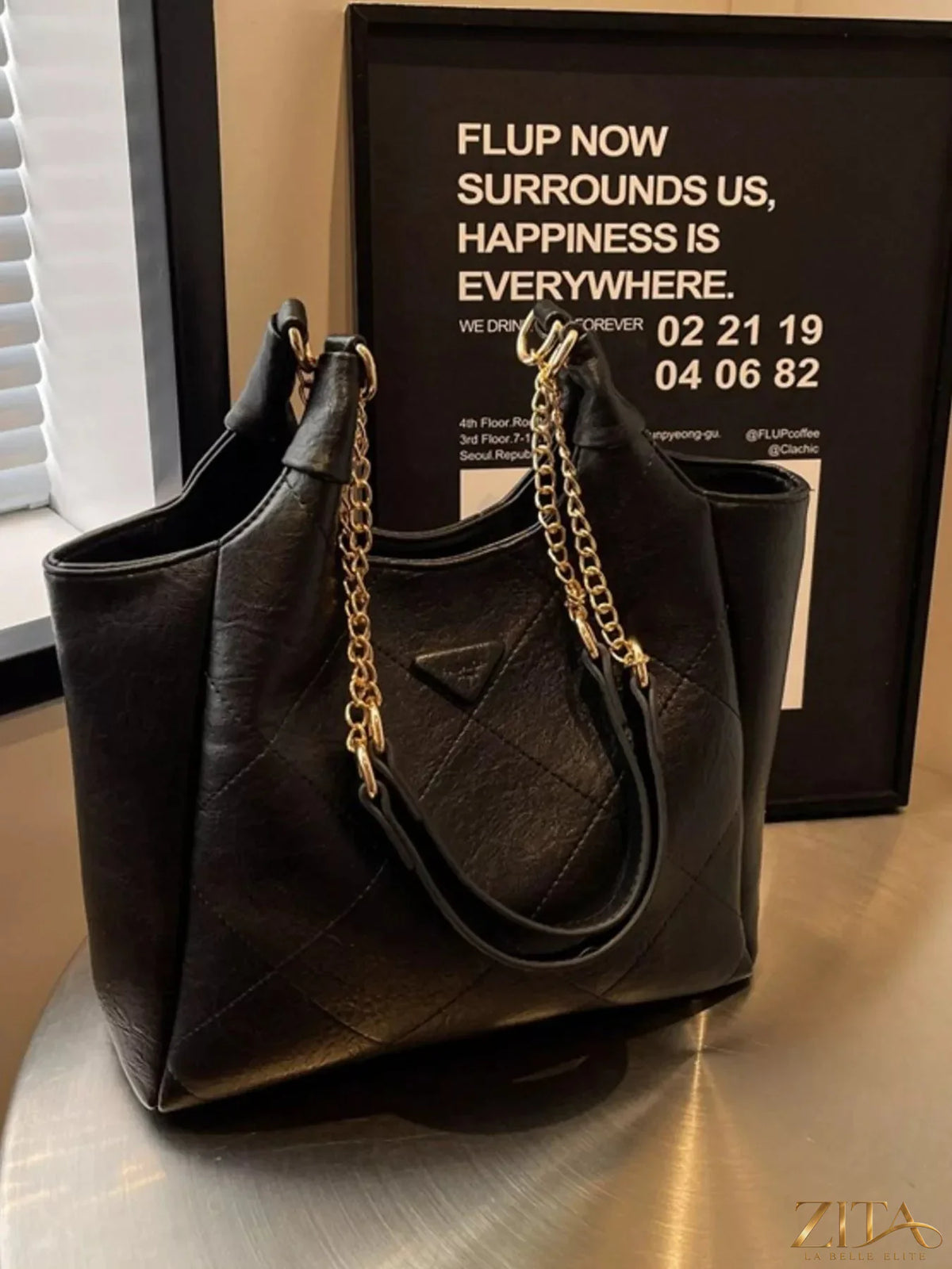 Trendsi PU leather shoulder bag with sleek design, featuring a spacious interior and stylish strap for everyday use.