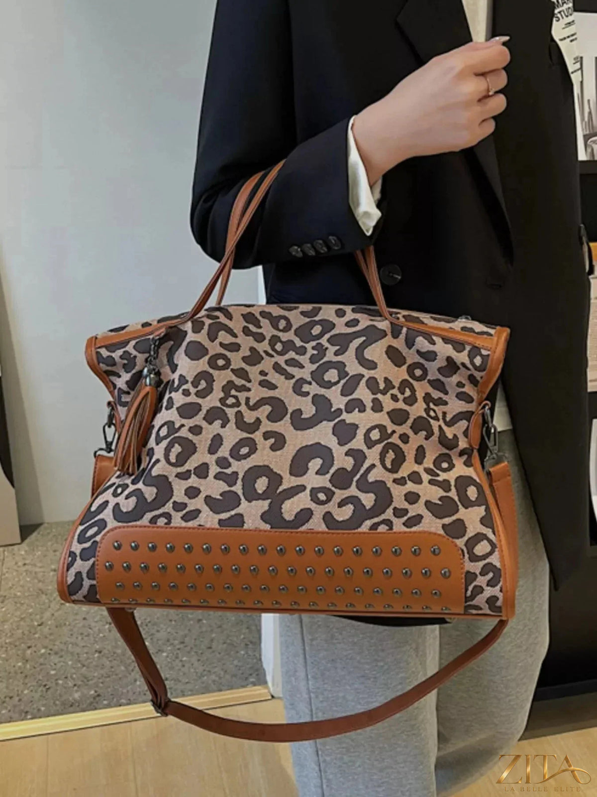Leopard printed studded tote bag by Zita La Belle Elite with gold hardware and sturdy handles, perfect for stylish everyday use.