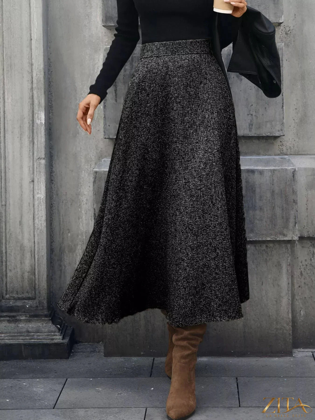 Gray A-line midi skirt by Trendsi featuring a flowy design and high waist, styled with side pockets and a midi length.