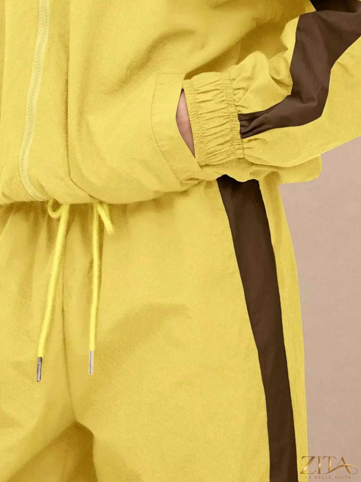 Zita La Belle Elite color-block tracksuit with matching wide-leg pants, featuring bold geometric design and comfortable fit.
