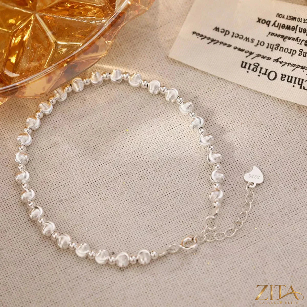 Sterling silver beaded bracelet with small round beads, stylish and elegant jewelry piece from Trendsi.