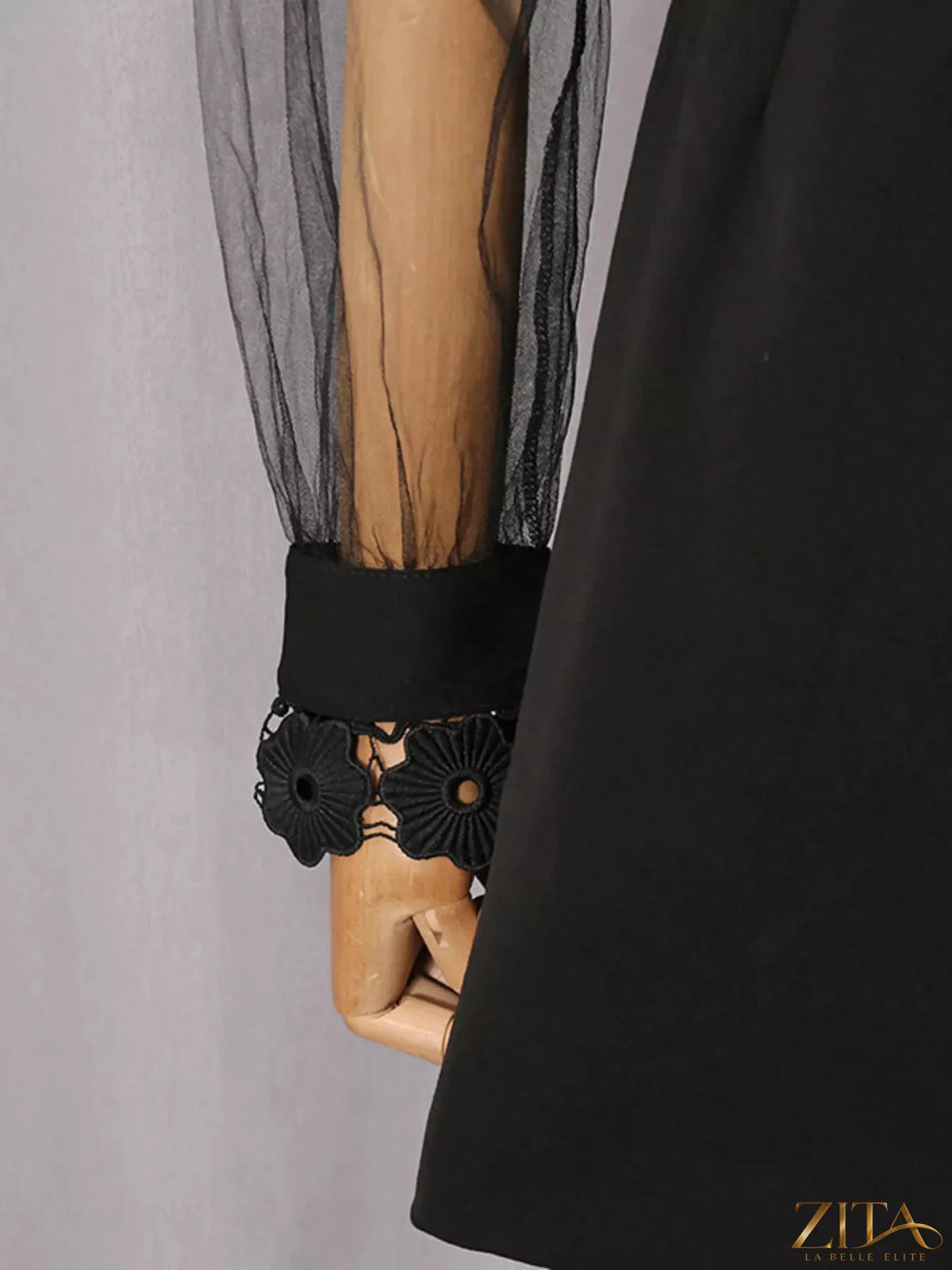 Lace sheer sleeve mini dress by Trendsi featuring a fitted silhouette, delicate lace details, and stylish sheer sleeves.