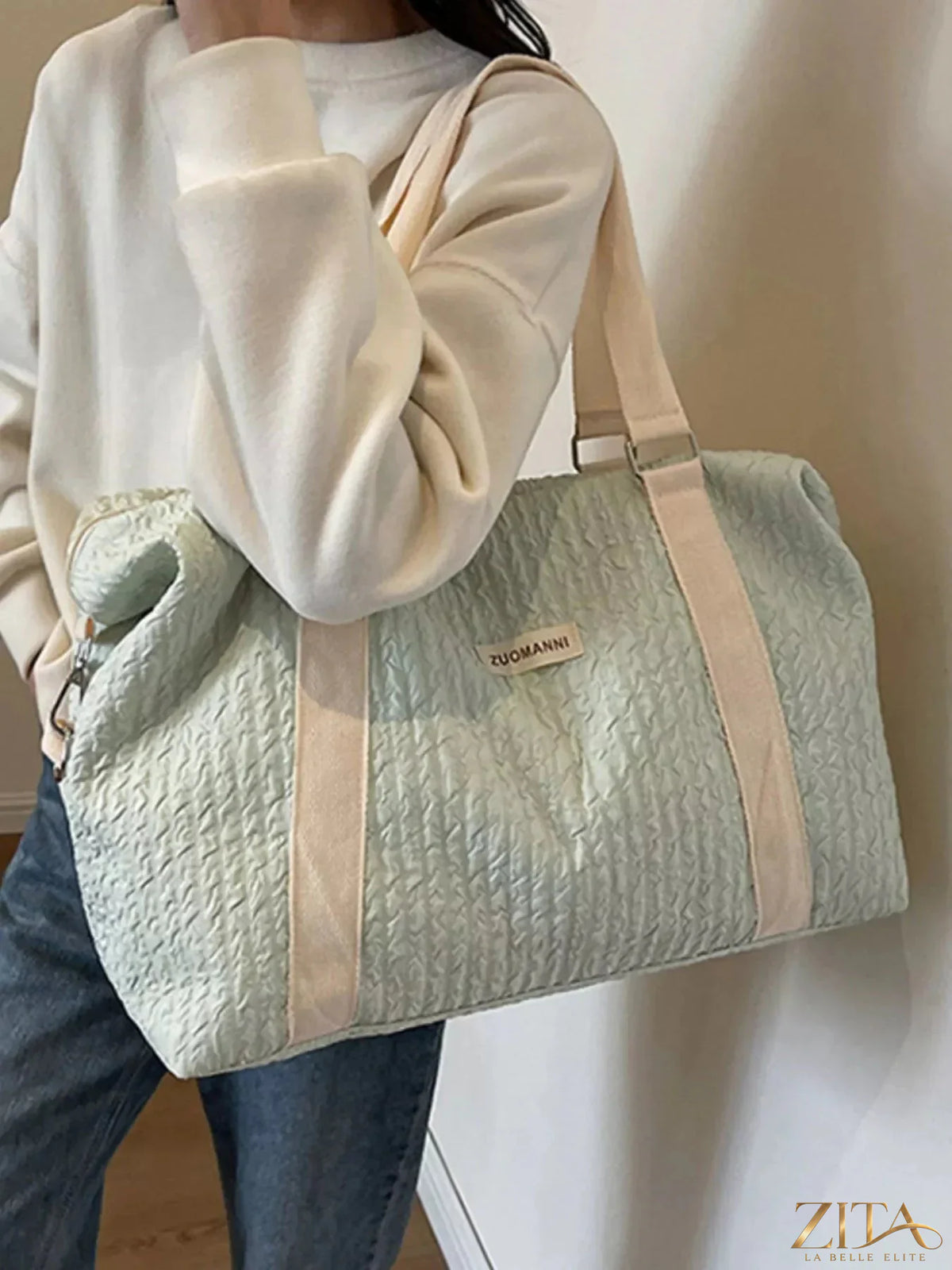 Zita La Belle Elite texture travel bag with adjustable strap, showing durable fabric and compact design for easy carrying.