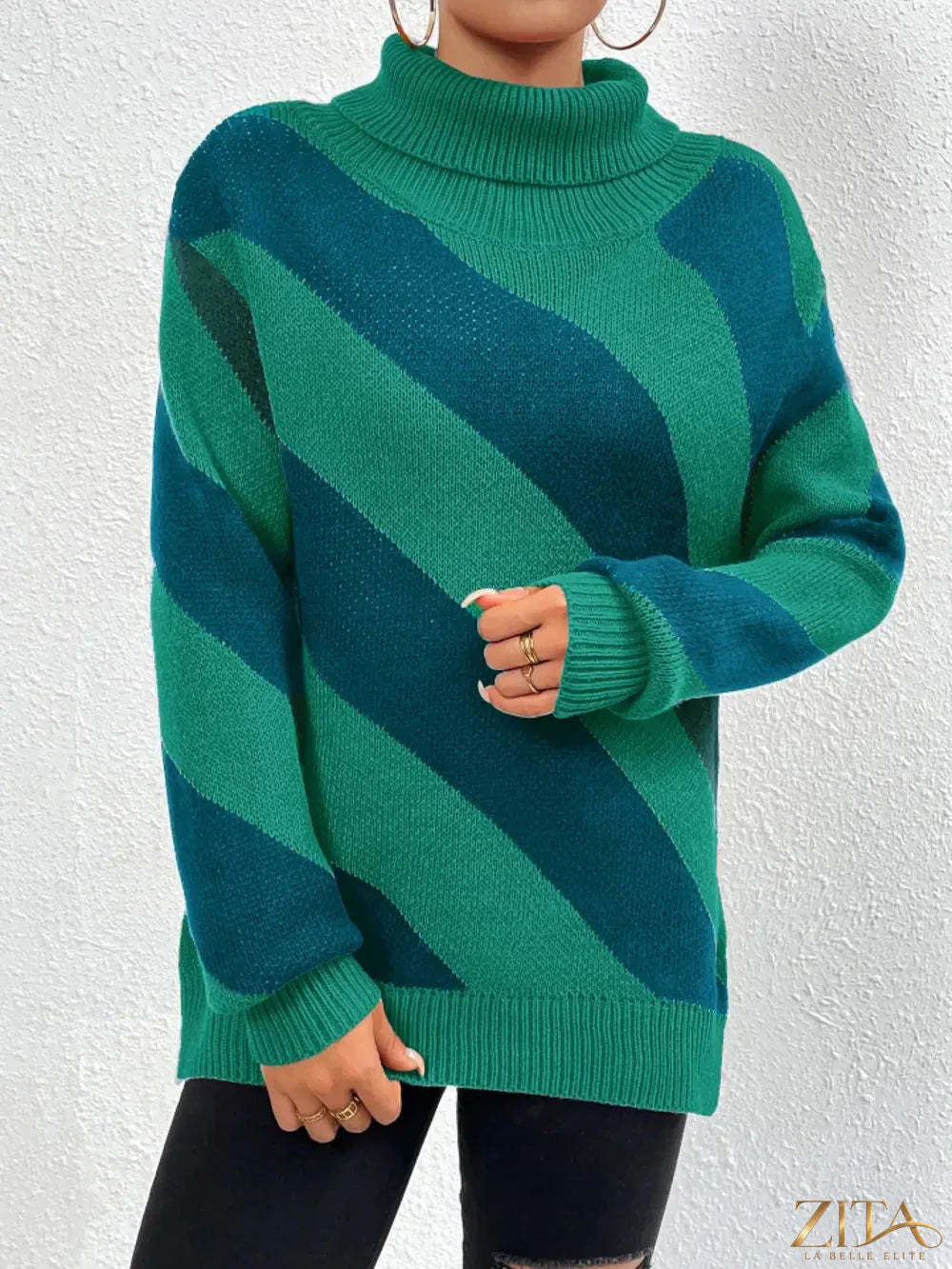 Striped turtleneck sweater with dropped shoulders by Trendsi, featuring a cozy, casual design in soft knit fabric.