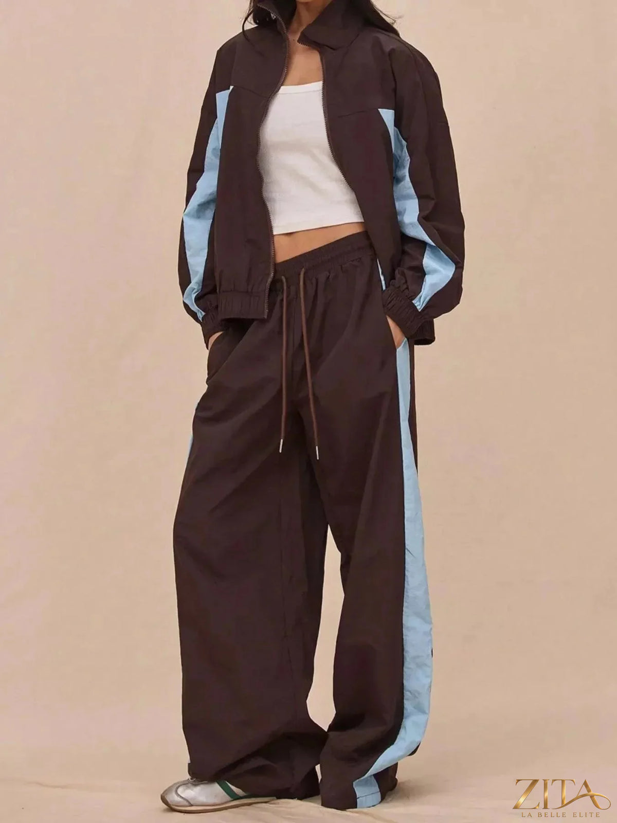 Color-block tracksuit and wide-leg pants set by Zita La Belle Elite, featuring vibrant color panels and relaxed fit.