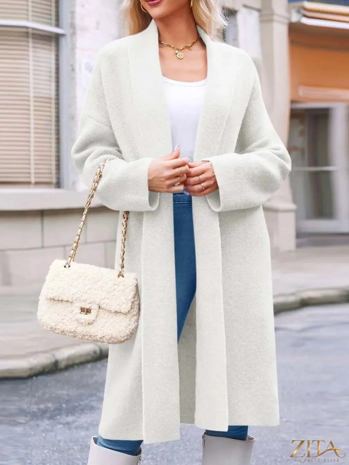 Zita La Belle Elite open front longline coat in neutral fabric, displayed hanging with a minimalist background.