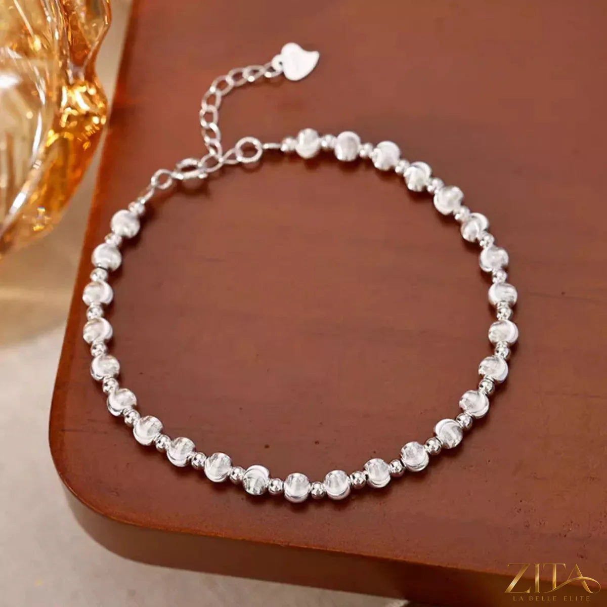 Sterling silver beaded bracelet with small round beads, stylish jewelry accessory from Trendsi.