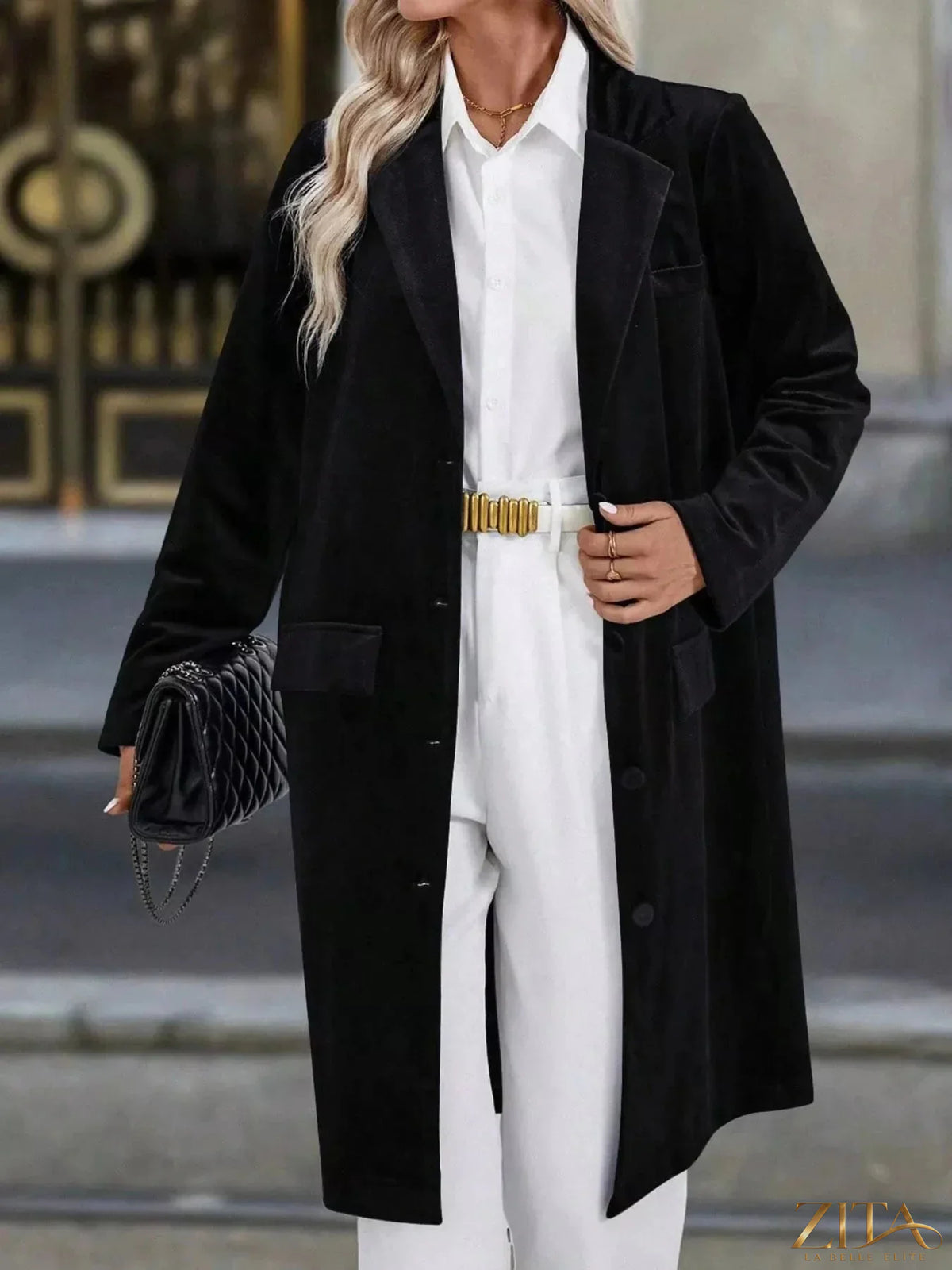 Zita La Belle Elite longline coat with lapel collar, long sleeves, and tailored fit, shown in a stylish outerwear image.