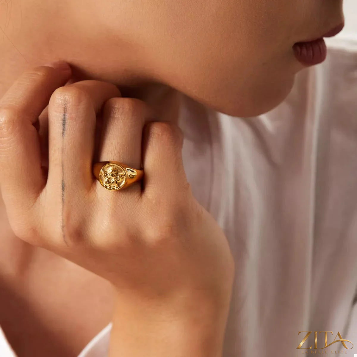 18K gold-plated Cupid ring by Zita La Belle Elite featuring a delicate Cupid design on a sleek band.