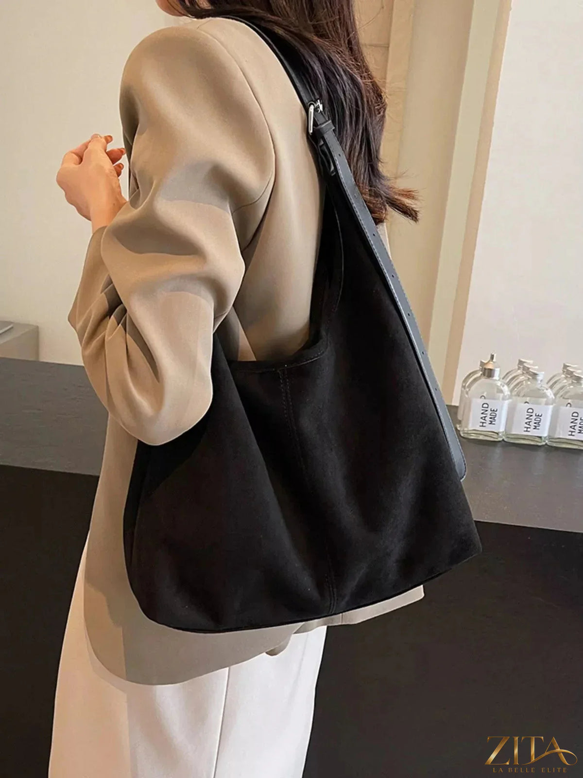 Zita La Belle Elite lightweight adjustable strap handbag with sleek design and top handle, perfect for everyday use.