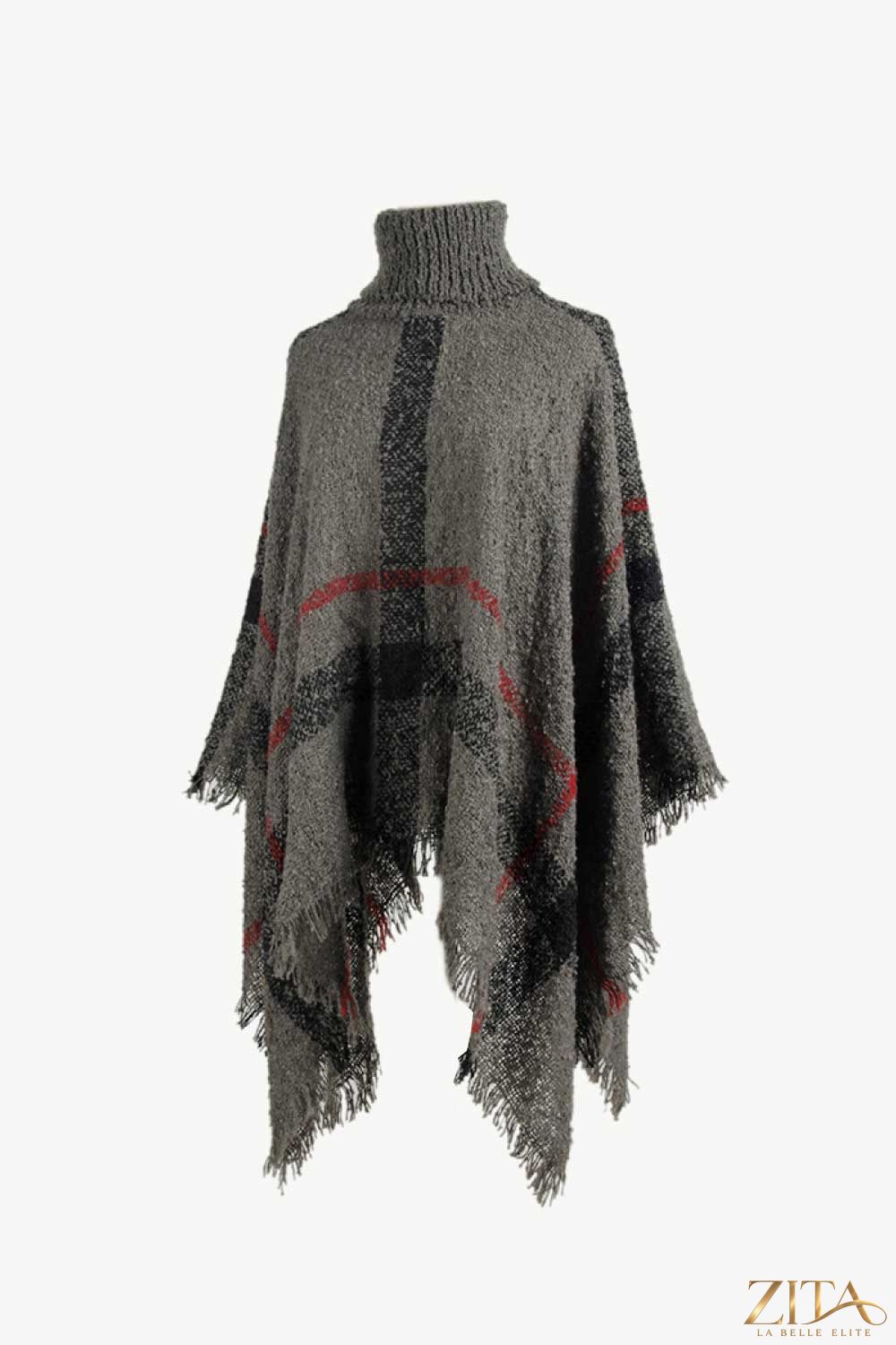 Plaid turtleneck raw hem poncho by Trendsi featuring a cozy, stylish plaid pattern and relaxed fit with raw hem detailing.