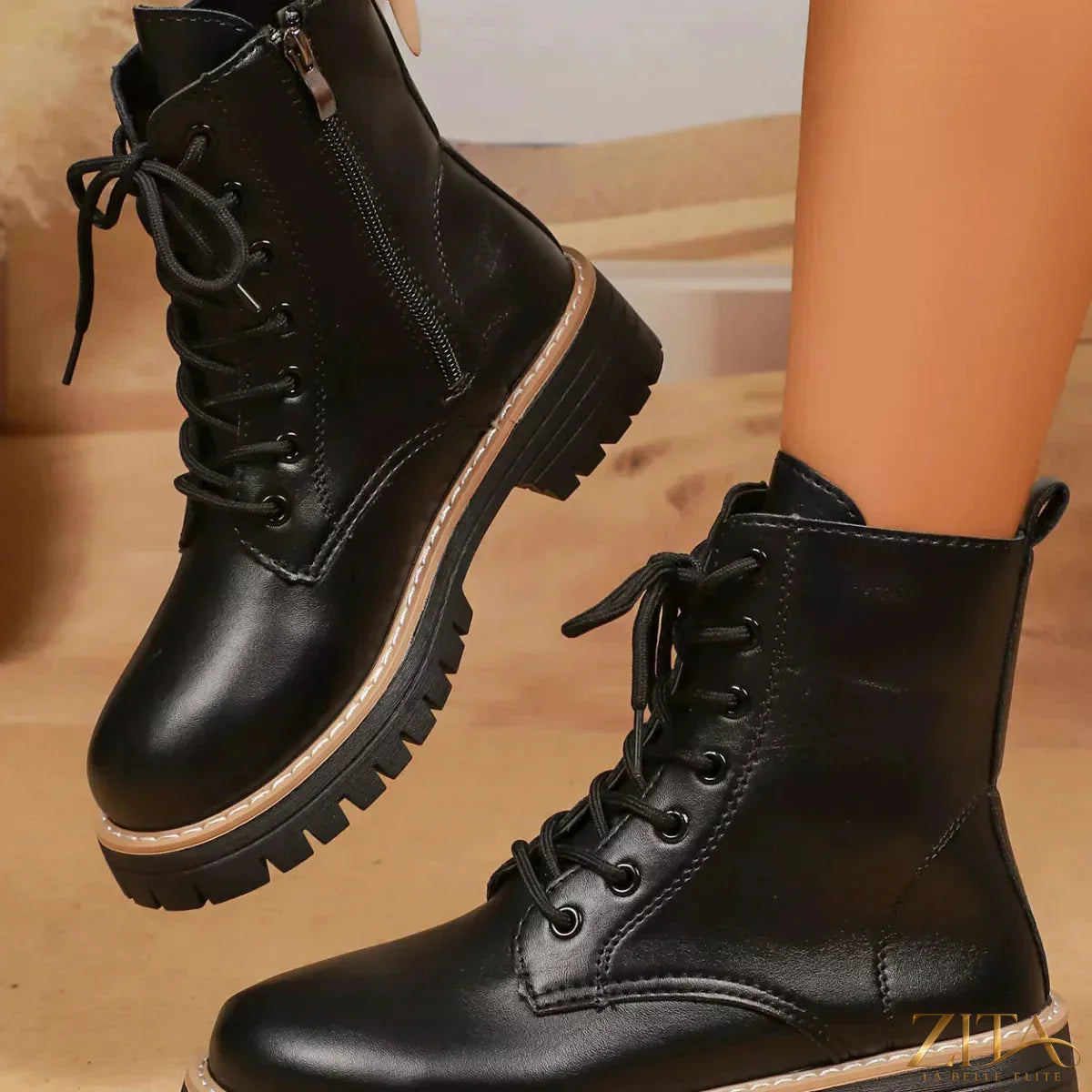 Black lace-up platform boots by Trendsi featuring chunky heels and rugged sole, stylish footwear for casual or edgy outfits.