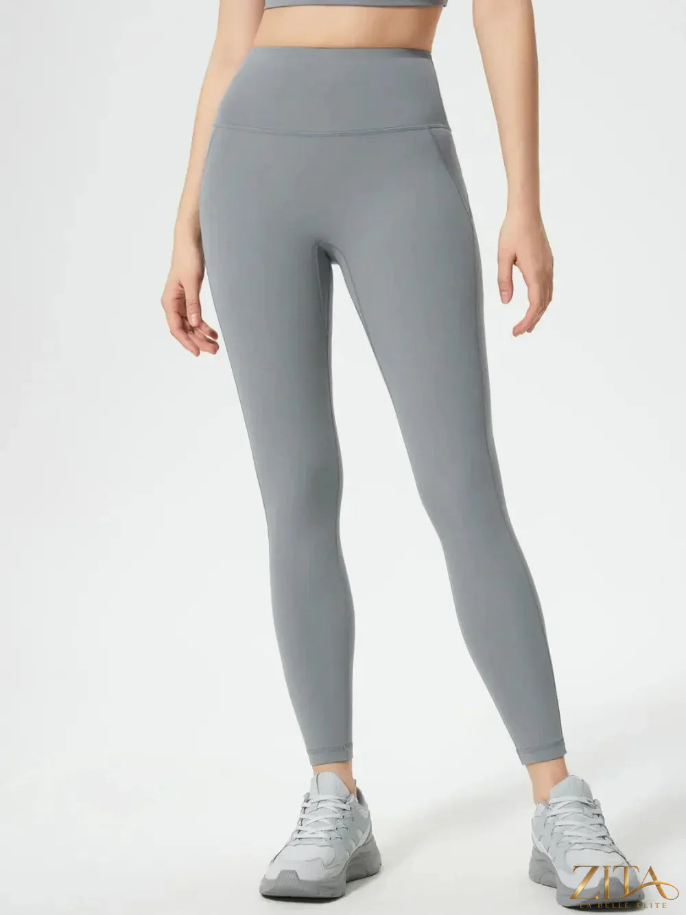 Millennia wide waistband active leggings by Trendsi, featuring a sleek fit and comfortable stretch, shown in black on a model.