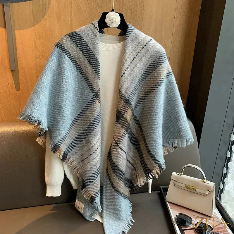 Raw hem plaid scarf by Trendsi featuring a cozy, stylish design with fringed edges and classic plaid pattern.