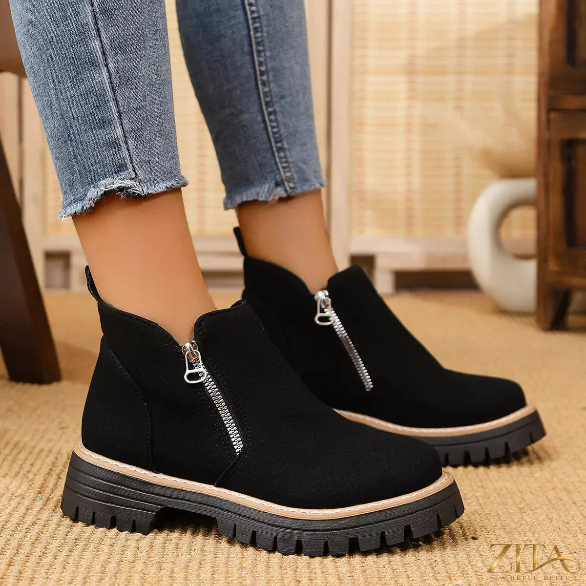 Zita La Belle Elite ankle boots with zipper accent, showcasing sleek black leather design and stylish ankle height.