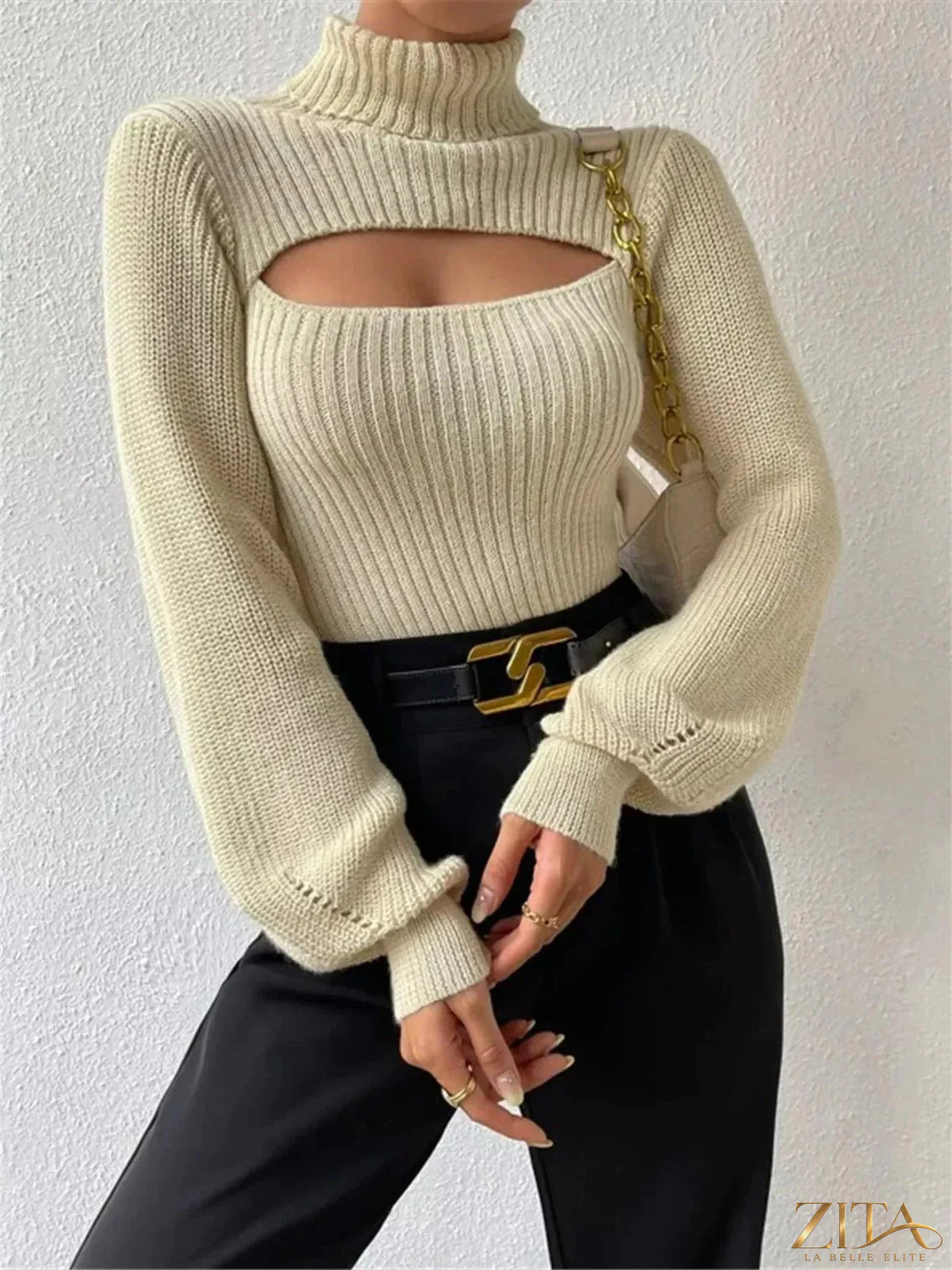 Trendsi cutout front turtleneck long sleeve sweater in black, showing the stylish neckline and fitted knit fabric.