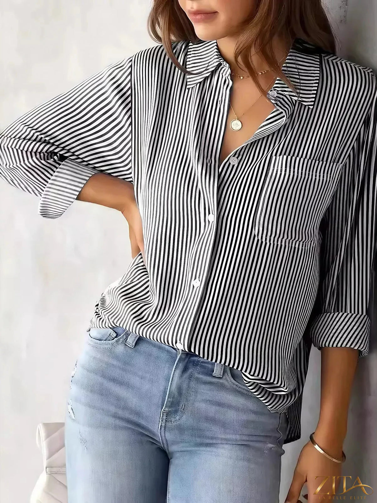 Zita La Belle Elite classic striped button-down shirt with blue and white vertical stripes, casual fit, and collar.