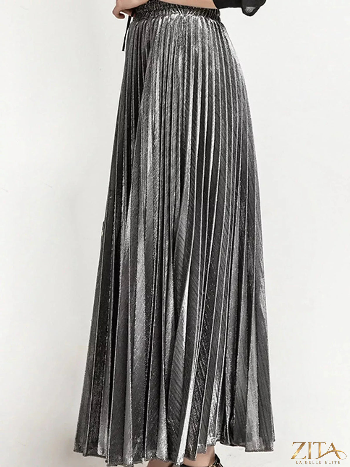 High-waisted pleated maxi skirt by Trendsi, flowing fabric with a stylish pleated design and comfortable fit.