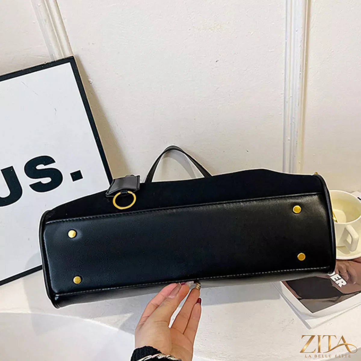 Trendsi PU leather shoulder bag with adjustable strap, featuring a sleek design and spacious interior for everyday use.