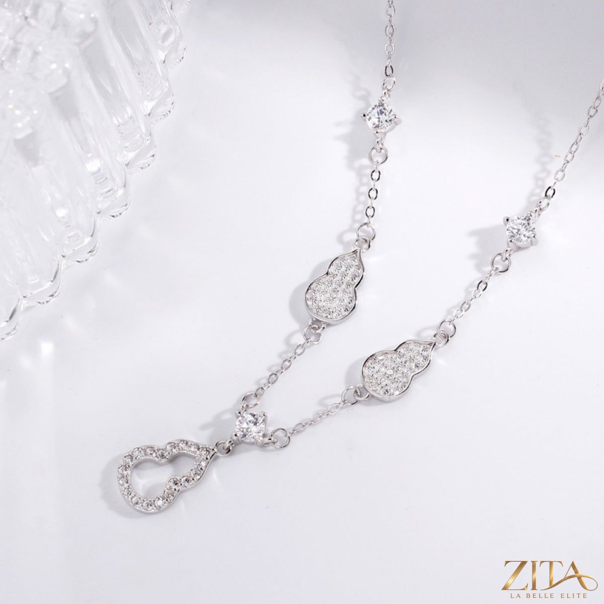925 Sterling Silver Zircon Gourd Necklace by Zita La Belle Elite featuring a detailed silver pendant with sparkling zircon stones.