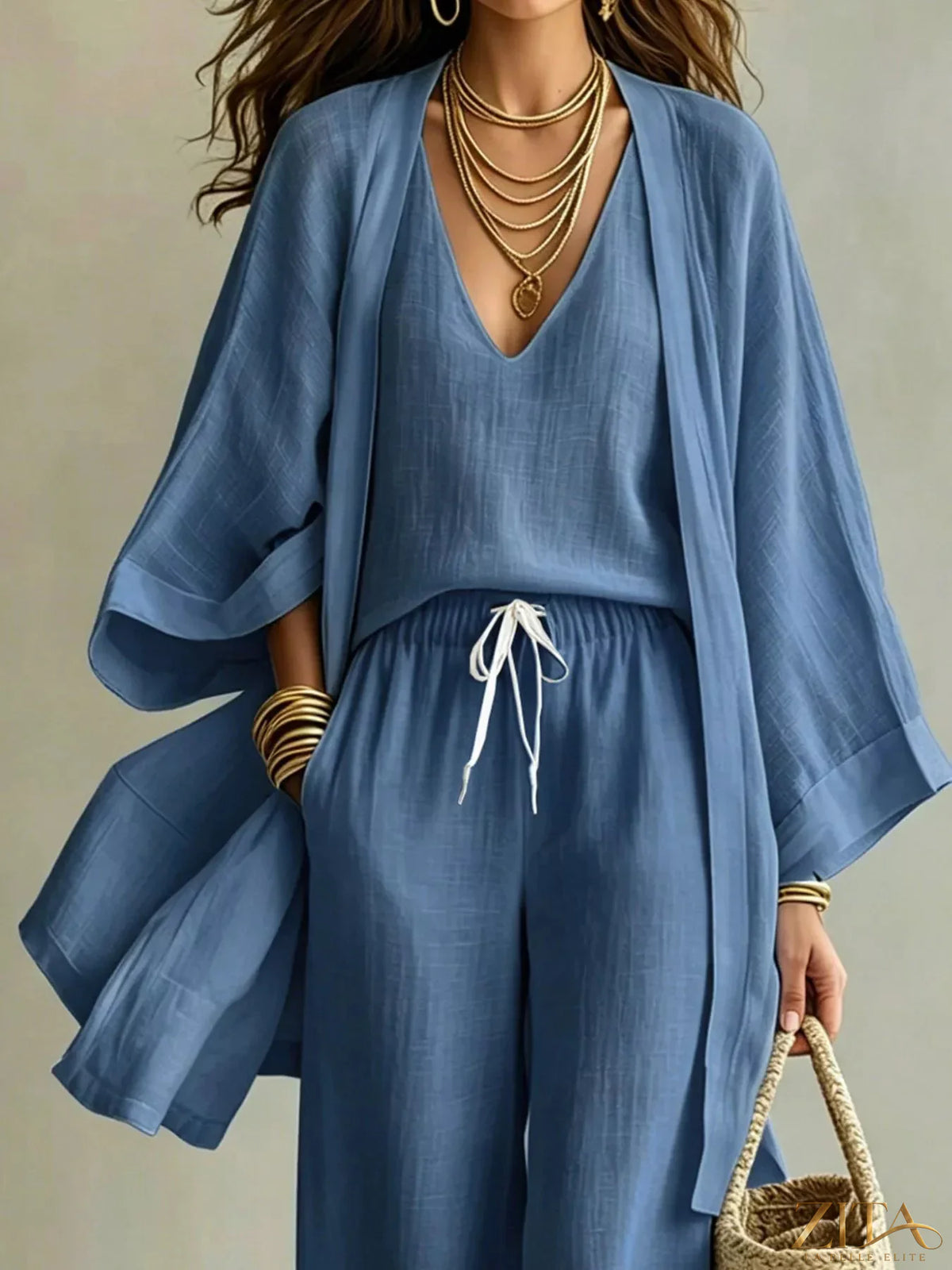Zita La Belle Elite three-piece set featuring a V-neck top, coordinating cardigan, and matching pants, all in a stylish, comfortable design.