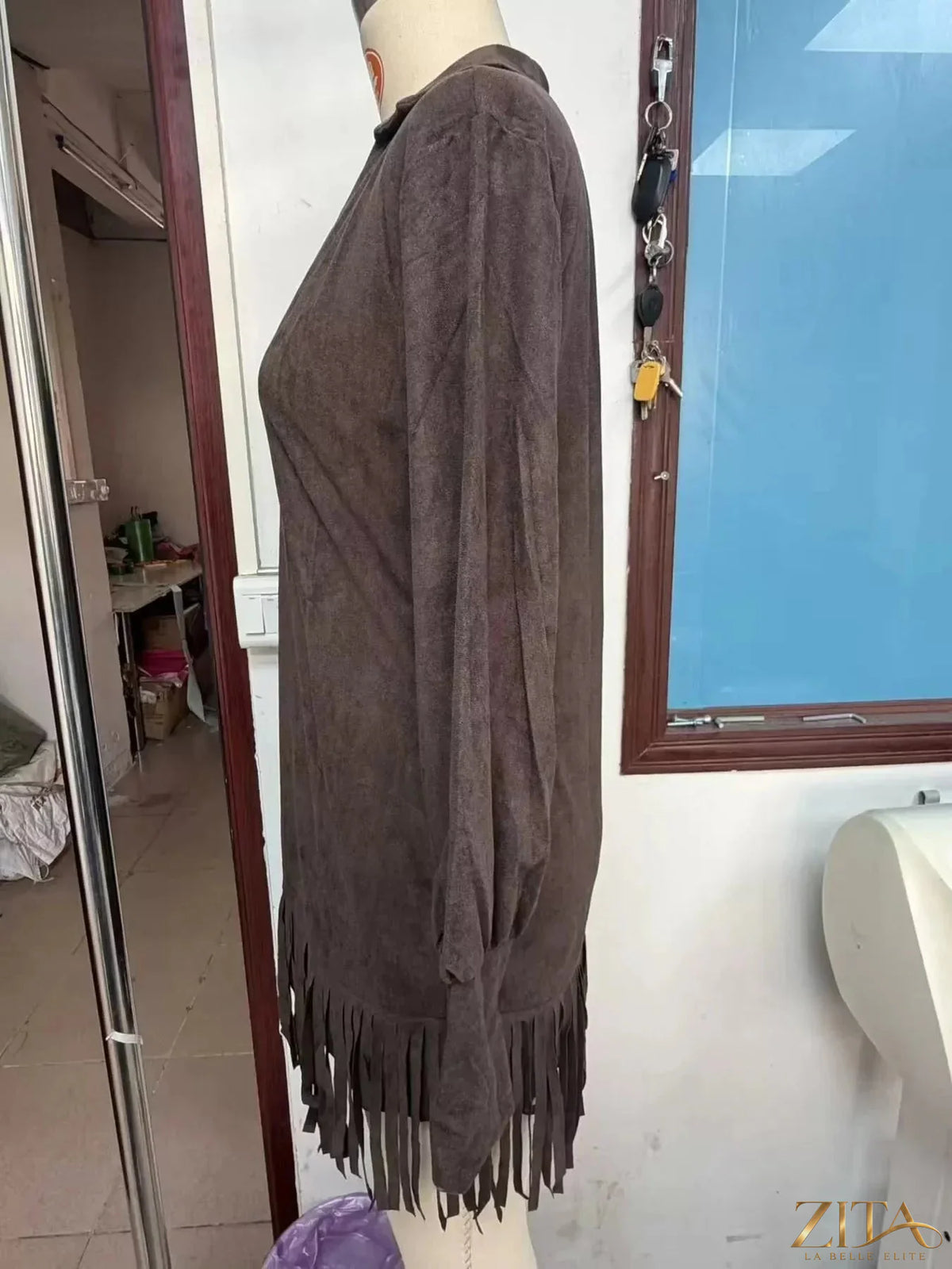 Trendsi fringed lantern sleeve dress featuring a flowy silhouette, intricate fringe details, and a stylish round neckline.