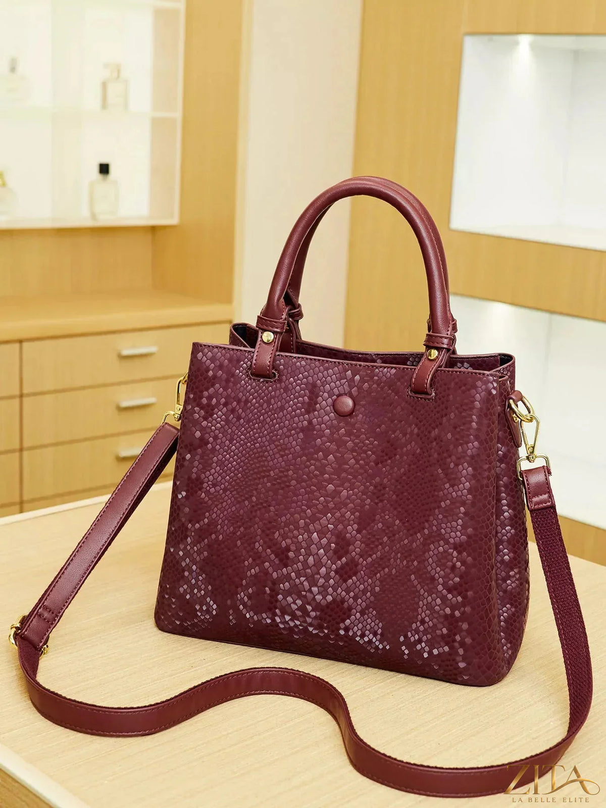 Zita La Belle Elite snakeskin pattern handbag with sleek design and textured surface, showcasing a stylish accessory for fashionistas.