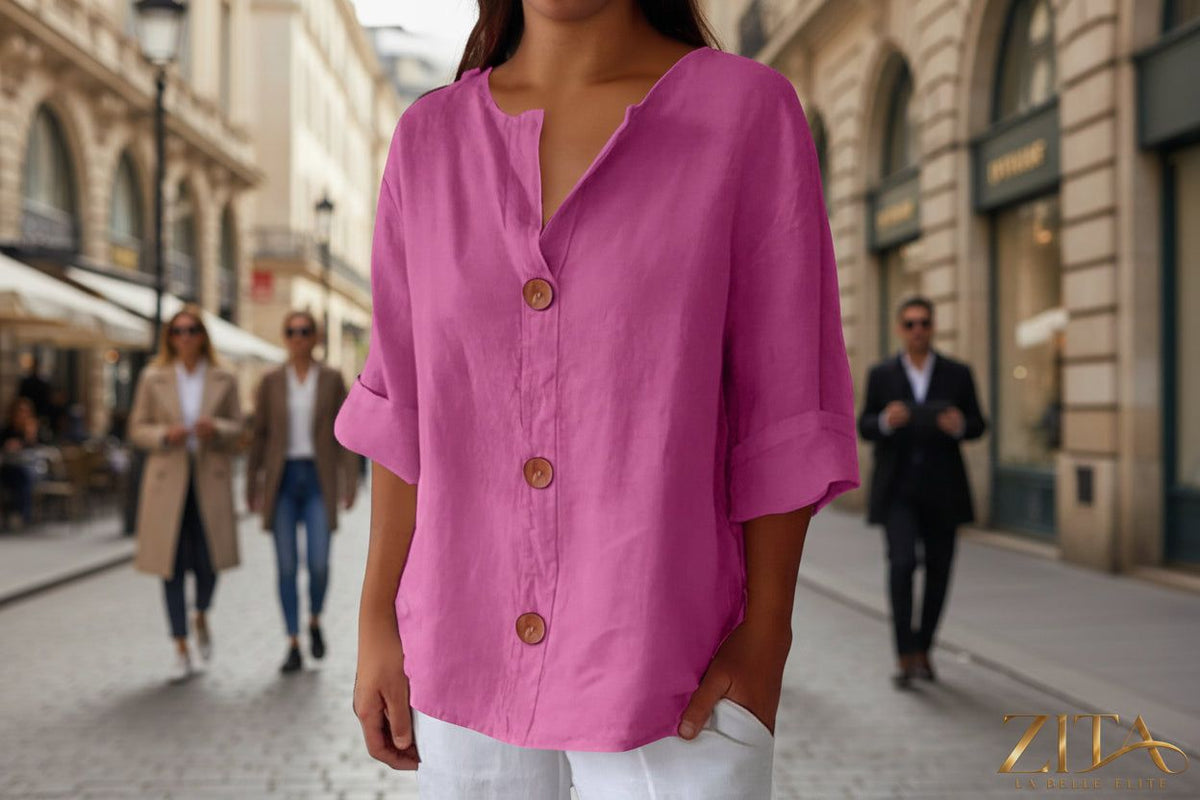 Women's V-neck cotton linen blouse with buttons, casualwear by Zita La Belle Elite, shown in a light, breathable fabric.
