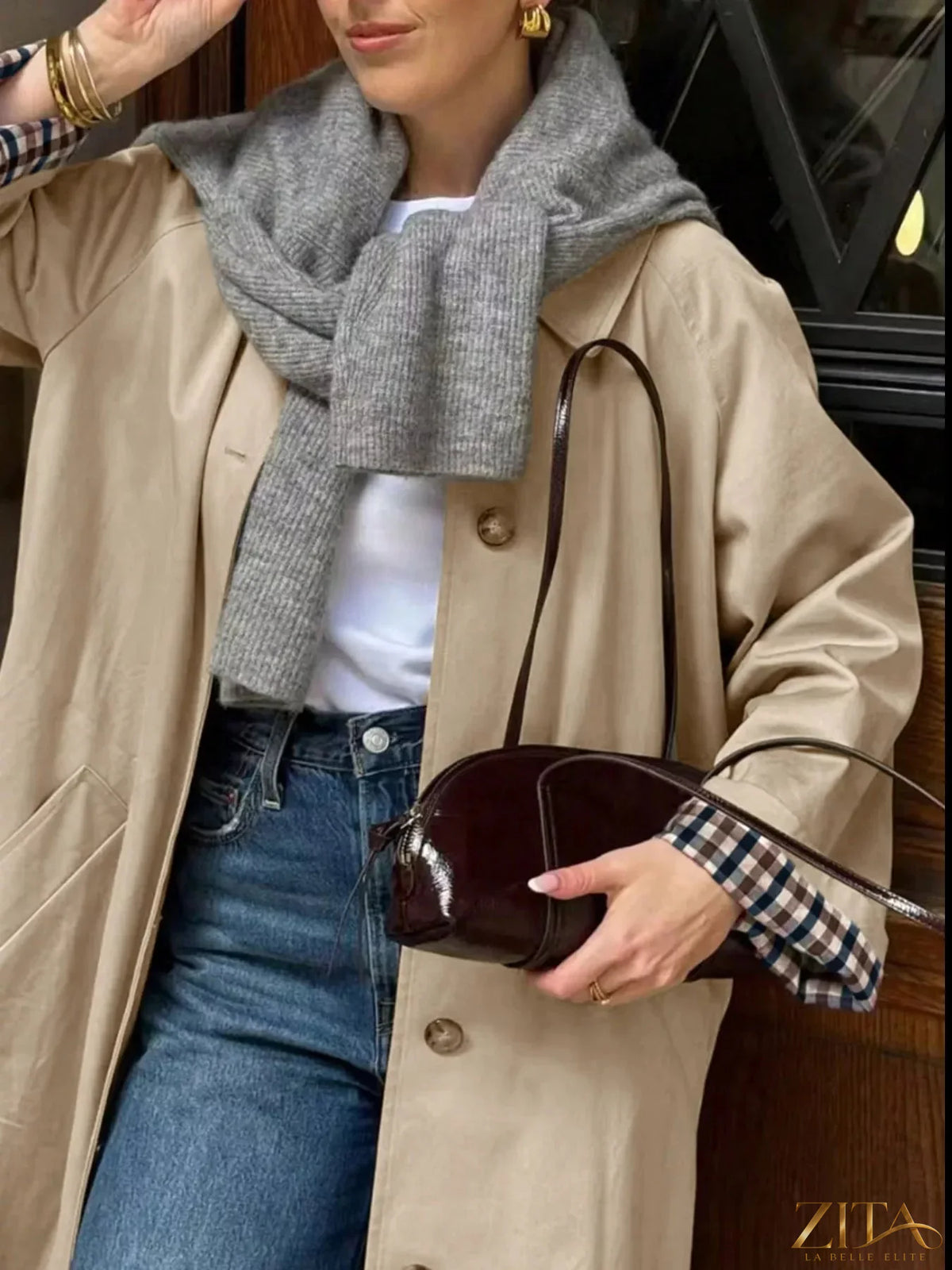 Checkered lining button-up trench coat by Zita La Belle Elite, featuring classic design and stylish checkered interior.