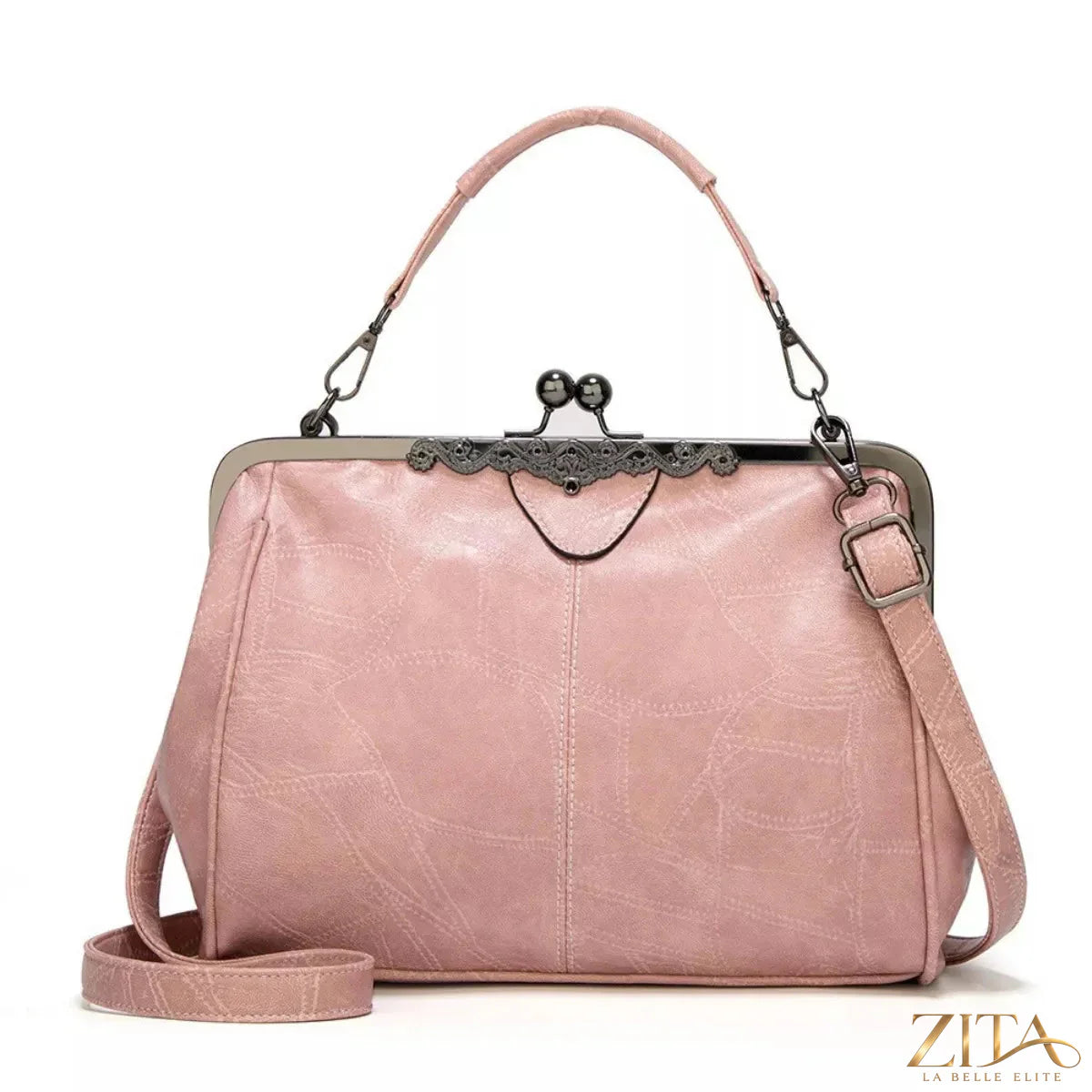 Vintage Zita La Belle Elite Kiss Lock leather handbag with metal clasp and classic design, showcasing elegant craftsmanship.