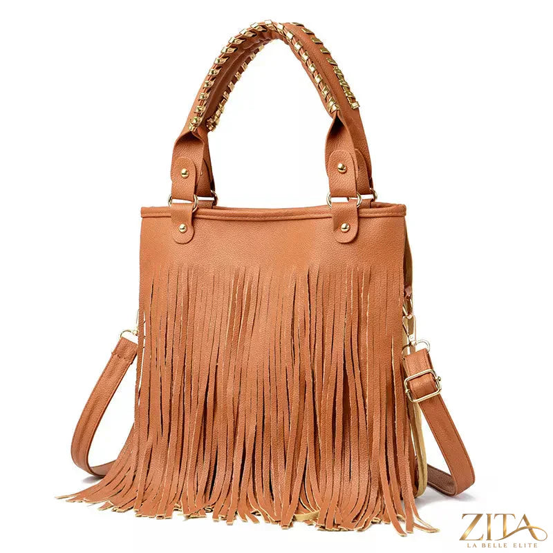 Zita La Belle Elite fringe PU leather handbag with tassel details and adjustable shoulder strap on a neutral background.