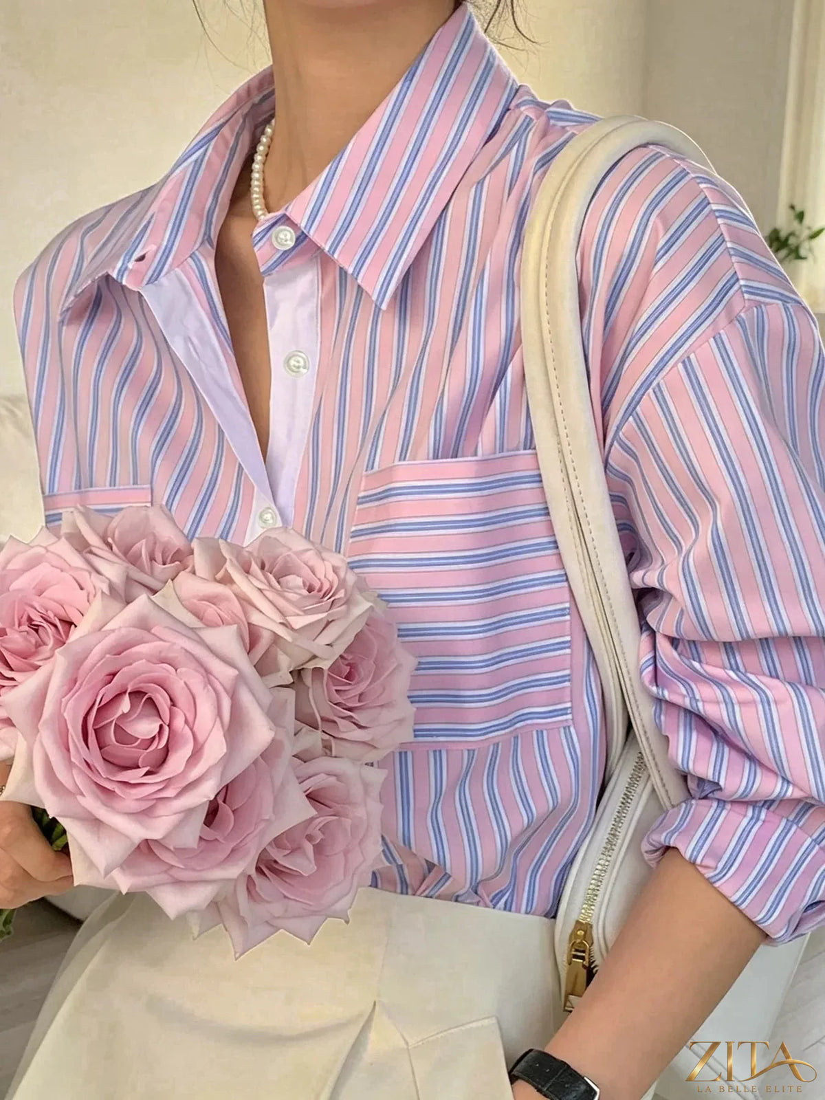 Zita La Belle Elite striped button-down shirt with vertical blue and white stripes, lightweight fabric, and classic collar.