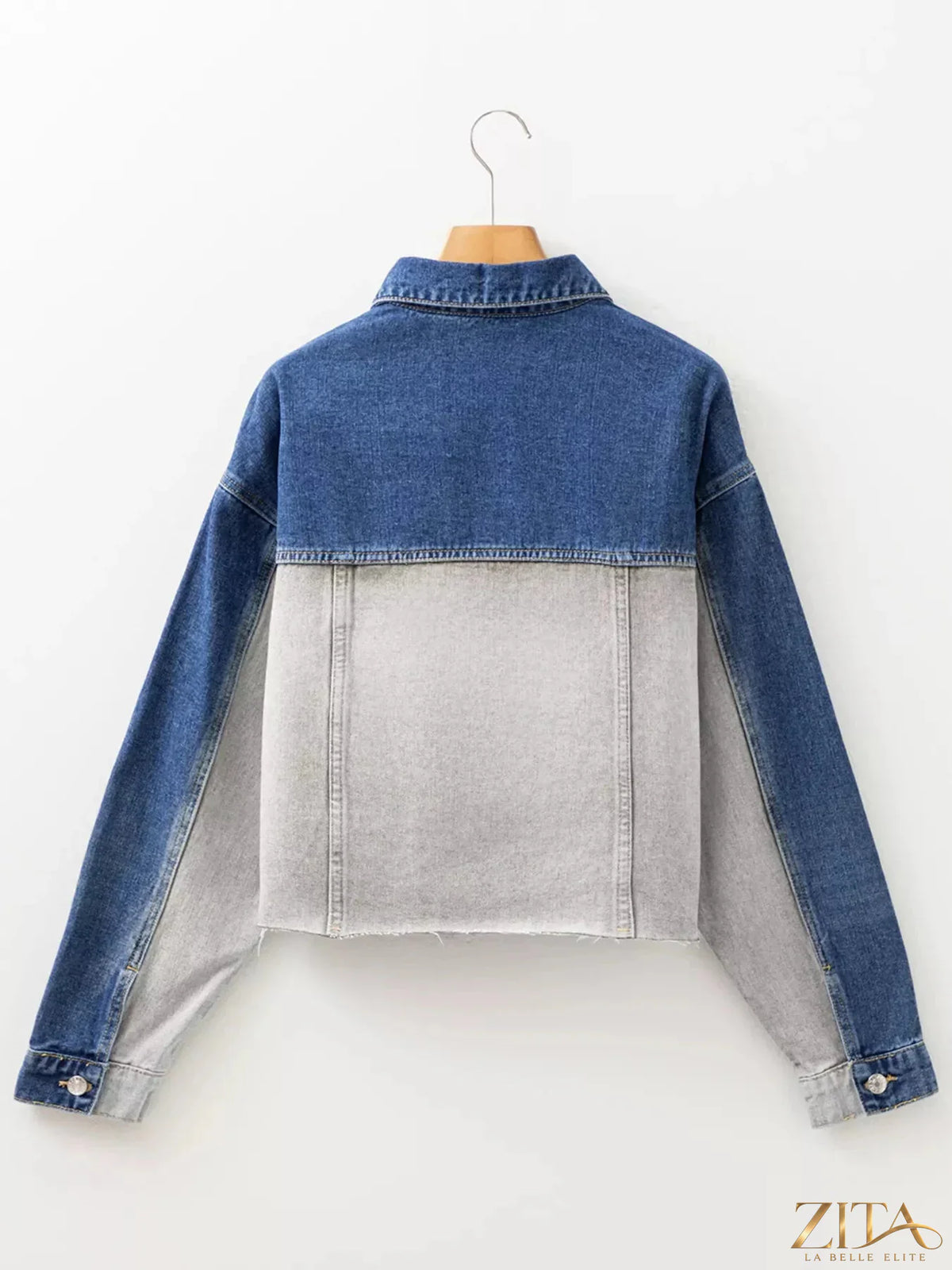 Color block patchwork raw hem denim jacket by Zita La Belle Elite, featuring mixed fabric panels and distressed raw hem detail.