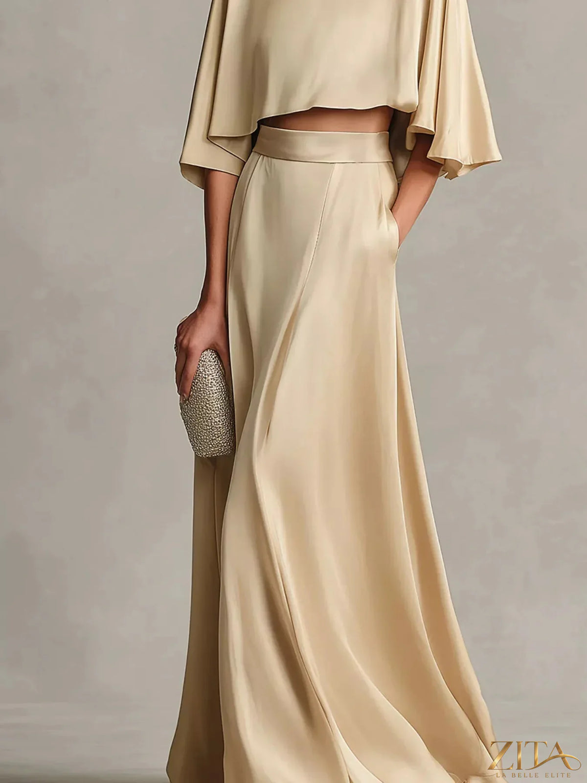 Plus size satin crop top and maxi skirt set by Zita La Belle Elite, stylish two-piece outfit with elegant fabric and modern design.