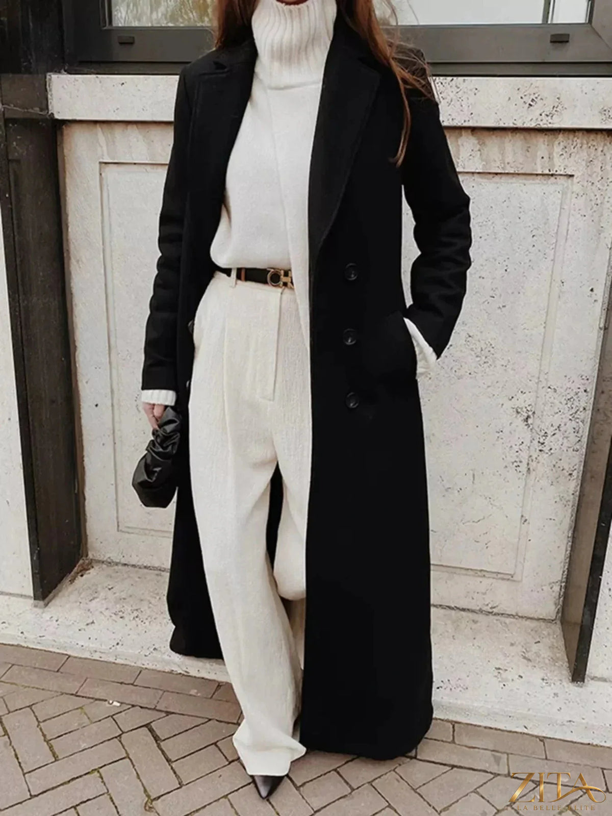 Zita La Belle Elite double-breasted longline overcoat with tailored lapels and button details, shown in a stylish, full-length view.