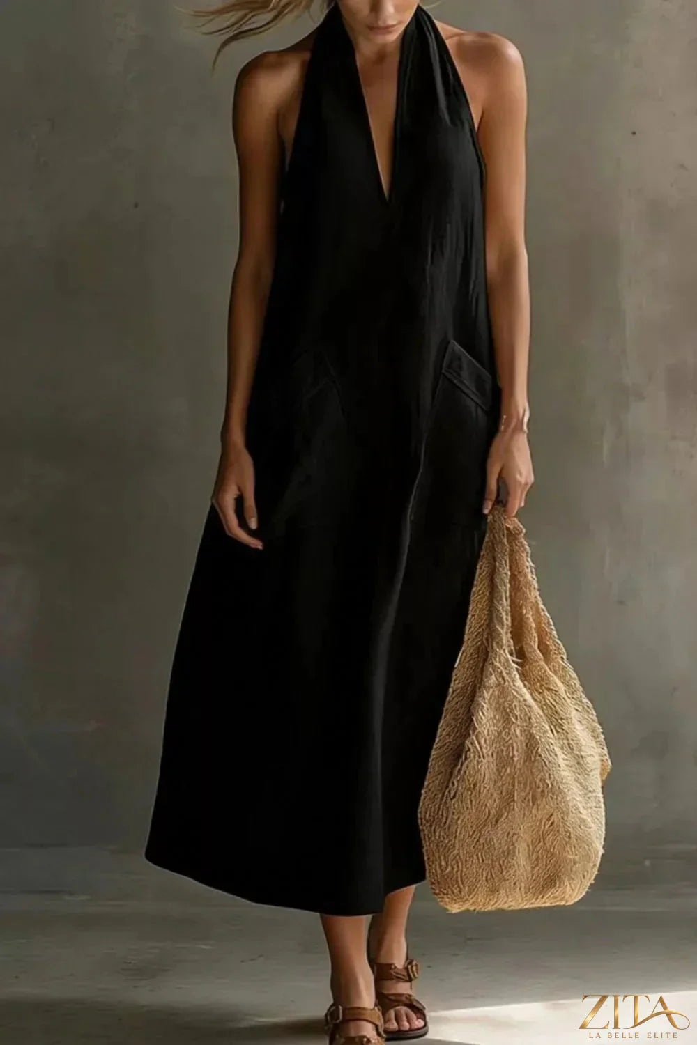 Casual Zita La Belle Elite halter neck midi dress with pockets, sleeveless design, and relaxed fit, perfect for summer wear.