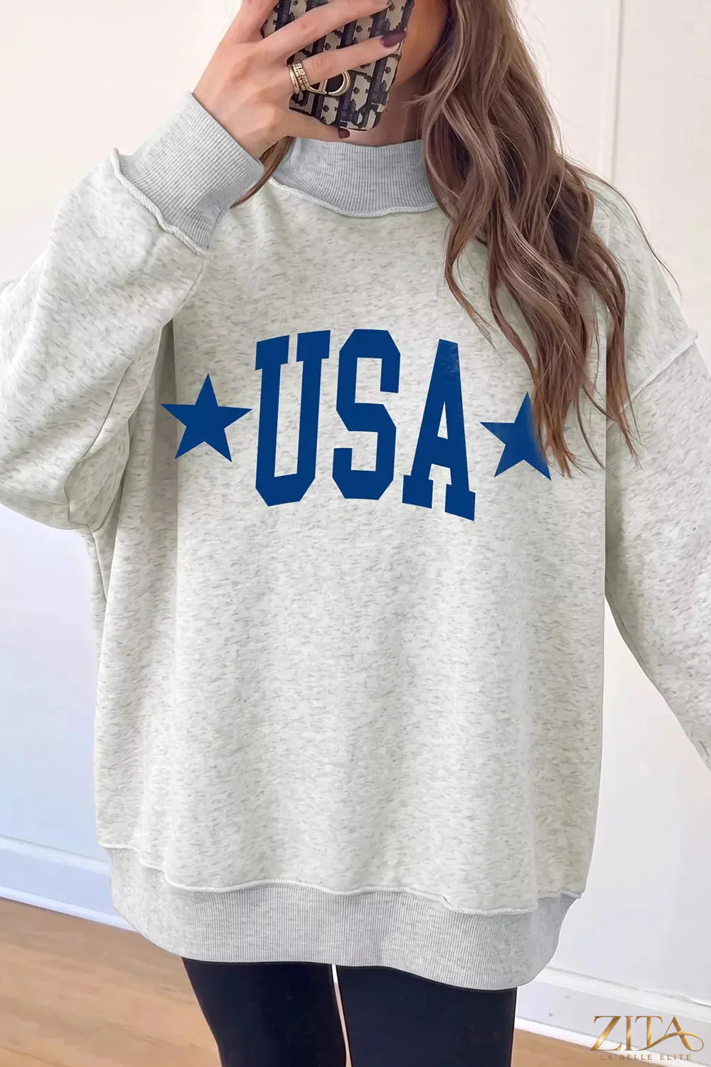 Zita La Belle Elite mock neck sweatshirt with USA slogan graphic, soft fabric, and comfortable fit, ideal for casual wear.