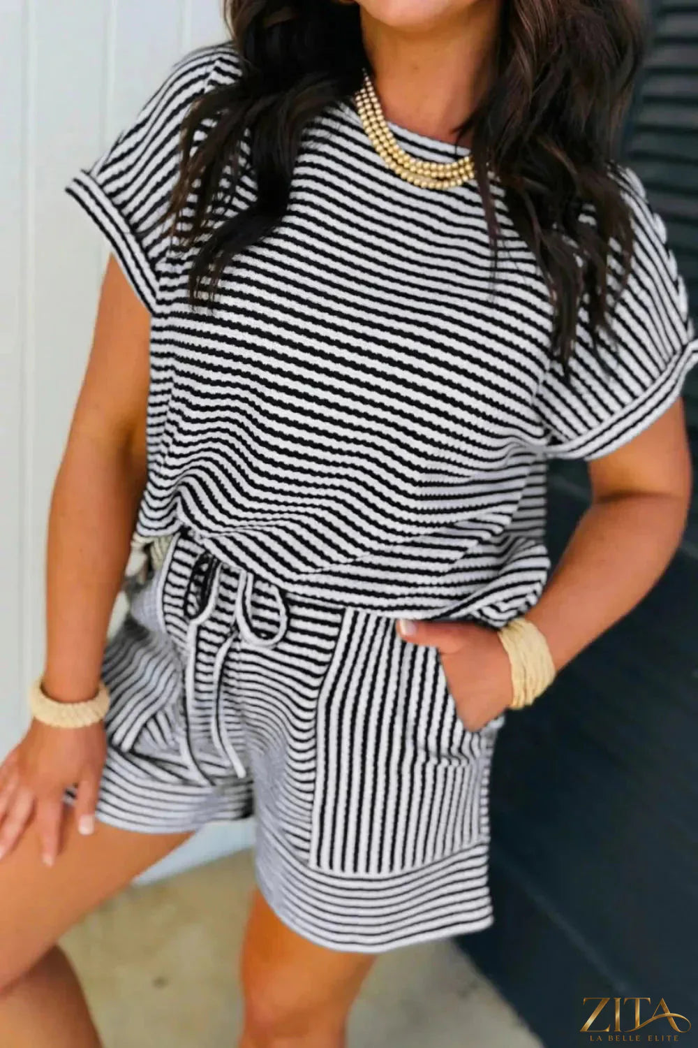 Striped knit short sleeve tee and matching shorts set by Trendsi, casual two-piece outfit for warm weather.