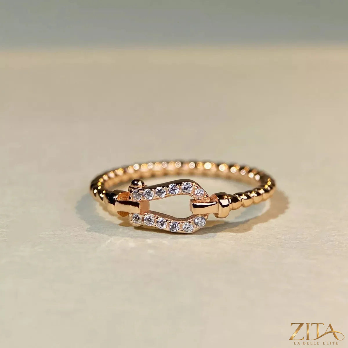925 Sterling Silver Zircon Horseshoe Shaped Ring by Zita La Belle Elite, featuring a sparkling zircon in a horseshoe design.
